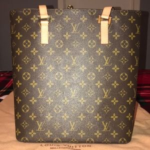 Louis Vuitton purse with storage bag